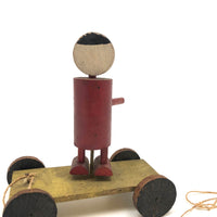 Red Man, Yellow Cart, Sweet Old Folk Art Pull Toy