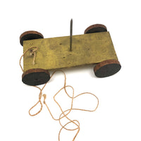 Red Man, Yellow Cart, Sweet Old Folk Art Pull Toy