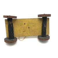 Red Man, Yellow Cart, Sweet Old Folk Art Pull Toy