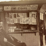 Fine Cigars, Saturday Evening Post, Man in Roseville/East Orange, NJ Train Station Waiting Room, 1899 Sepia Print