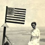 Woman in White with Folk Art American Flag and Water View, Curious Old Snapshot Photo