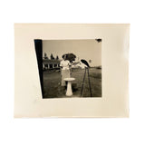 Woman with Stork and Bird Bath at Gulf Gas Station, Curious Little Trick Snapshot, c. 1940s