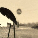 Woman with Stork and Bird Bath at Gulf Gas Station, Curious Little Trick Snapshot, c. 1940s