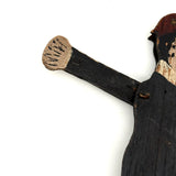 Well Knocked Around Old Wire Jointed Man with Red Stockings and Large Hands
