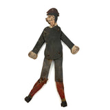 Well Knocked Around Old Wire Jointed Man with Red Stockings and Large Hands