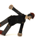 Well Knocked Around Old Wire Jointed Man with Red Stockings and Large Hands
