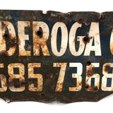Old Shot Up "Ticonderoga Office" Sign