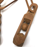 Carved Whimsy Chain with Ball in Cage and Geometric Form at Ends