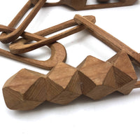 Carved Whimsy Chain with Ball in Cage and Geometric Form at Ends