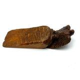 Internal Conflict: Antique Pennsylvania Folk Art Doorstop with Carved Eagle