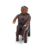 Charming Small Carved Folk Art Man in Chair