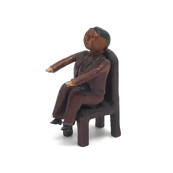 Charming Small Carved Folk Art Man in Chair
