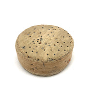Ice Cream Sandwich of an Antique Pincushion with Handwoven Woolen Edging