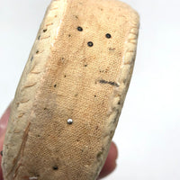 Ice Cream Sandwich of an Antique Pincushion with Handwoven Woolen Edging