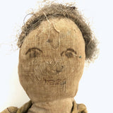 Much Loved Antique Straw Stuffed Doll with Painted Face and Gray Hair