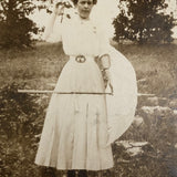 Curiously Posed Woman with Parasol and Raised Hand, Antique RPPC