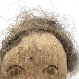 Much Loved Antique Straw Stuffed Doll with Painted Face and Gray Hair