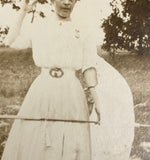 Curiously Posed Woman with Parasol and Raised Hand, Antique RPPC