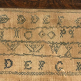 Alphabets in Blue with Wavering Lines and Many Extra Tries, Early 19th C. Practice Sampler
