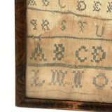 Alphabets in Blue with Wavering Lines and Many Extra Tries, Early 19th C. Practice Sampler