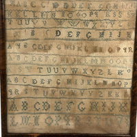 Alphabets in Blue with Wavering Lines and Many Extra Tries, Early 19th C. Practice Sampler