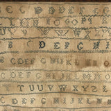 Alphabets in Blue with Wavering Lines and Many Extra Tries, Early 19th C. Practice Sampler