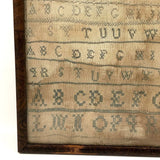 Alphabets in Blue with Wavering Lines and Many Extra Tries, Early 19th C. Practice Sampler