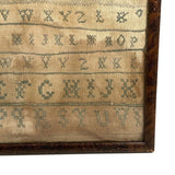 Alphabets in Blue with Wavering Lines and Many Extra Tries, Early 19th C. Practice Sampler