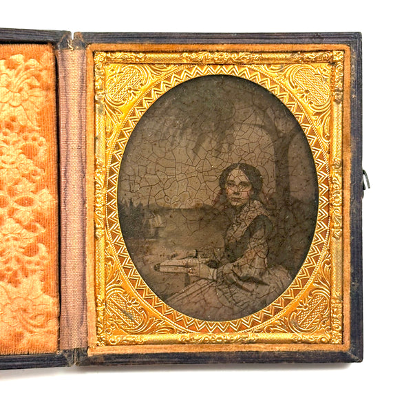 Young Woman with Book and Tree, Evocative Early, Hand-colored, Degraded Cased Ambrotype