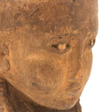 Vintage Carving of Intense Girl with Braids, Presumed Hispaniolan