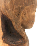 Vintage Carving of Intense Girl with Braids, Presumed Hispaniolan