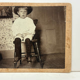 Bright Eyed Child in Chair with Patterned Rug and Wallpaper, Beautiful Antique Mounted Photo