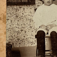 Bright Eyed Child in Chair with Patterned Rug and Wallpaper, Beautiful Antique Mounted Photo