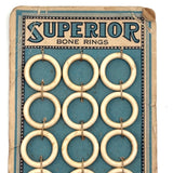 Super Satisfying Superior Bone Rings on Sky Blue Card