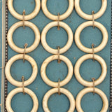 Super Satisfying Superior Bone Rings on Sky Blue Card
