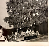 Beaming Boy with Christmas Tree, Lionel Train, Diversely Populated Putz Village
