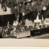 Beaming Boy with Christmas Tree, Lionel Train, Diversely Populated Putz Village