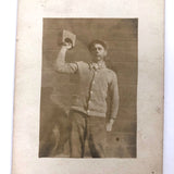 Scrawny Strongman, Young Man Lifting Weight (with Nice Shadow) RPPC