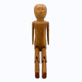Tall and Wide Eyed Articulated Figure with Little Mouth and Ached Eyebrows