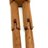 Tall and Wide Eyed Articulated Figure with Little Mouth and Ached Eyebrows