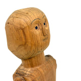 Tall and Wide Eyed Articulated Figure with Little Mouth and Ached Eyebrows