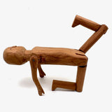 Tall and Wide Eyed Articulated Figure with Little Mouth and Ached Eyebrows