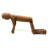 Tall and Wide Eyed Articulated Figure with Little Mouth and Ached Eyebrows