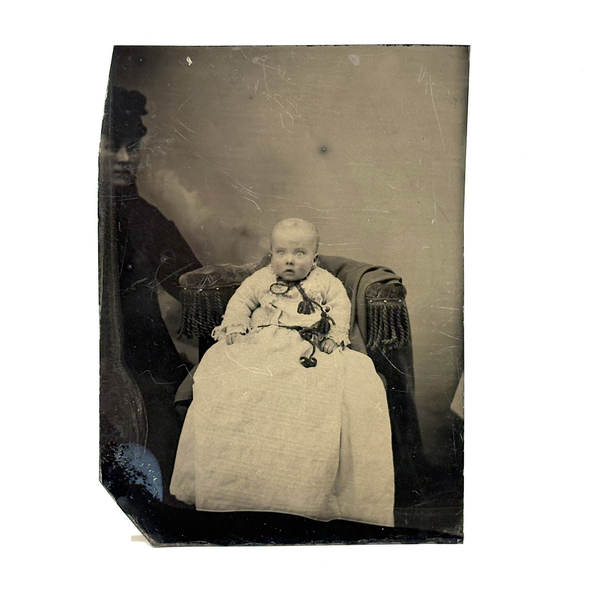 Existential Feeling Tintype Portrait of a Wide Eyed Baby with Half Hidden Mother