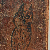 Ink Drawn Non-Plussed Owl on Antique Leather Book Cover