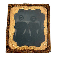 Dark and Moody Early Tintype of Two China Dolls and their Bed