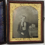 Serious Young Man: Sixth Plate Cased Daguerreotype of Boy with Books