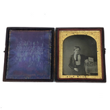 Serious Young Man: Sixth Plate Cased Daguerreotype of Boy with Books