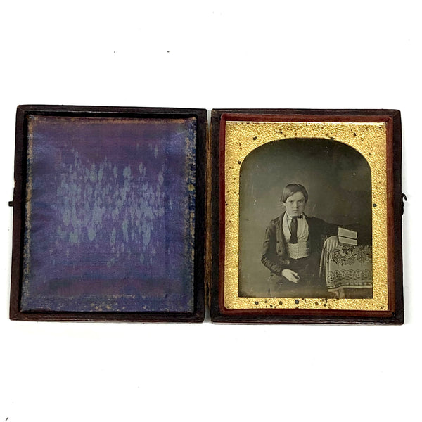 Serious Young Man: Sixth Plate Cased Daguerreotype of Boy with Books