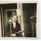 Wonderful c. late 20s/early 30s Snapshot of Man at Microphone Framed in Verticals